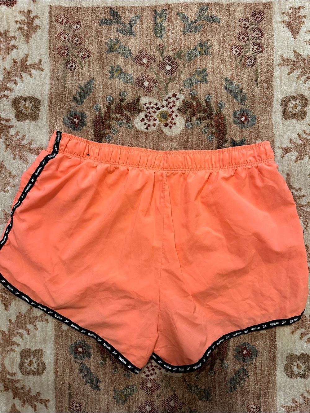 Reebok Women's Coral-Orange Athletic Shorts with Black Trim - Picture 6 of 6